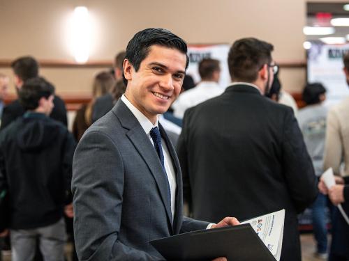 Student at a networking event.
