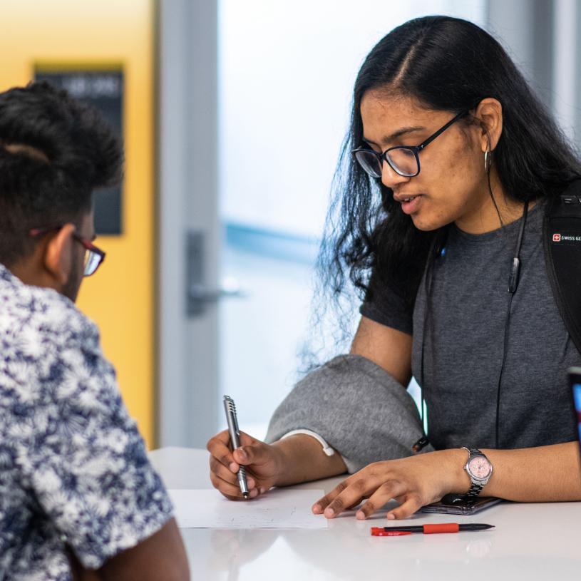 A student receiving assistance.