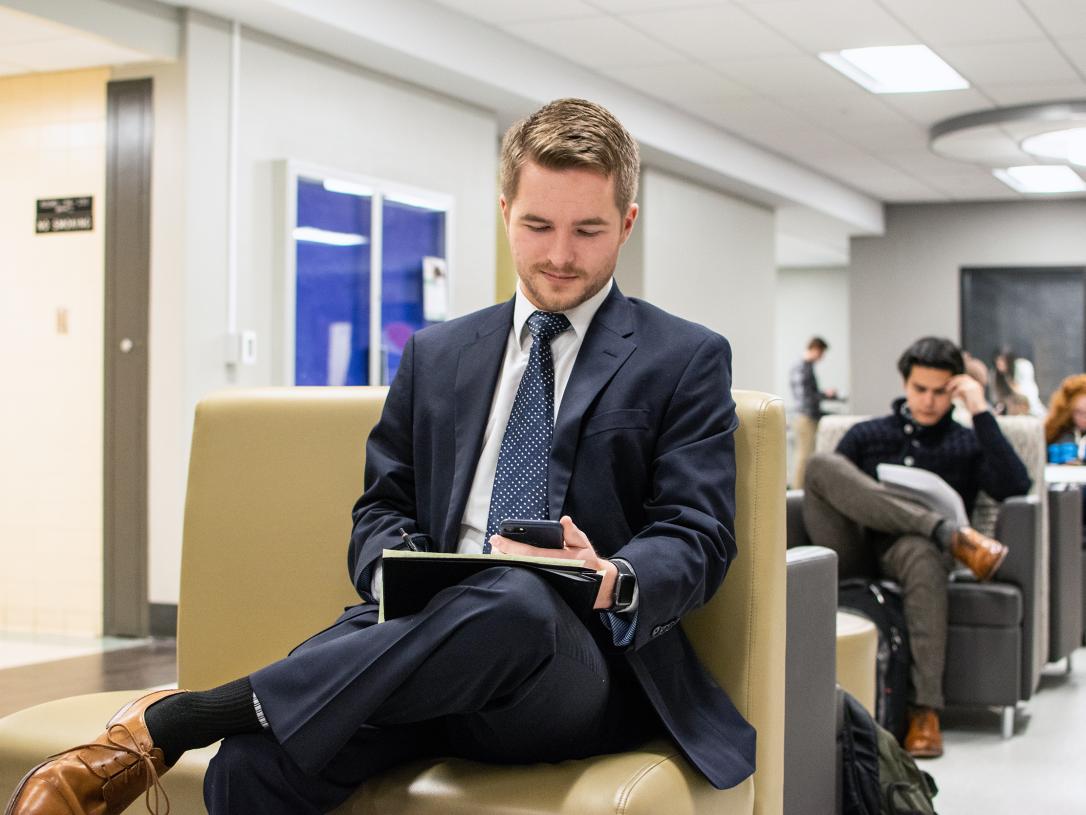 Male student sitting in Kettler