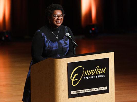 Omnibus speaker Ashley C. Ford speaks to the audiece in Auer Performance Hall