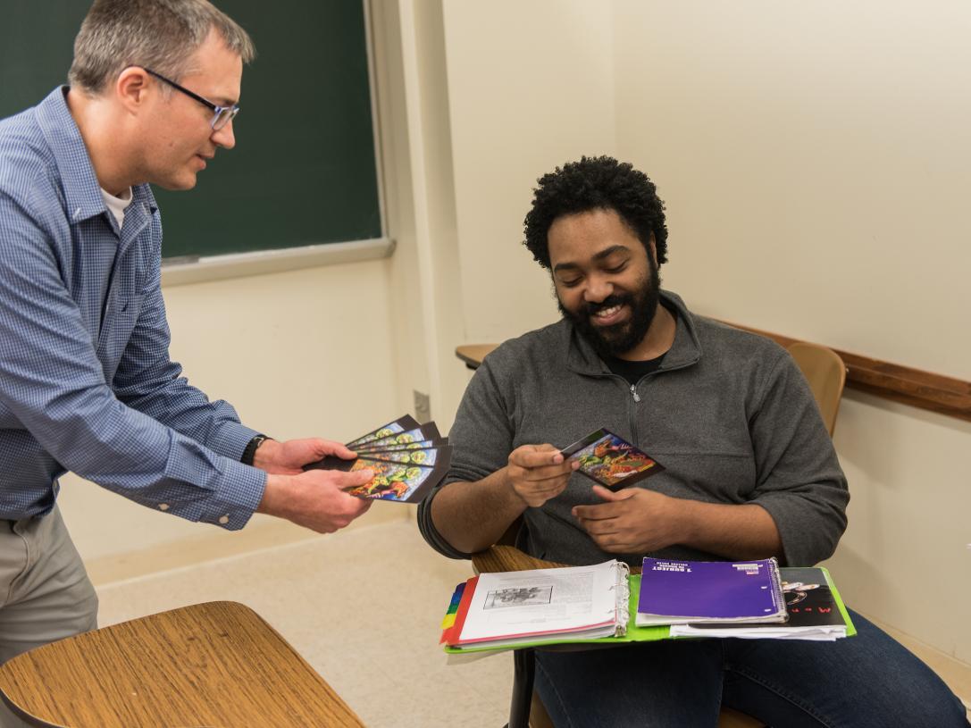 Student and professor in German class.