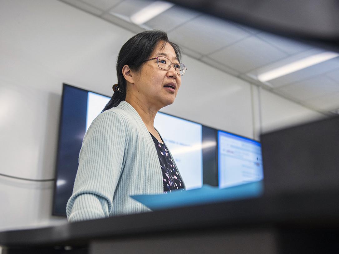 Professor Chao Chen teaching in a classroom