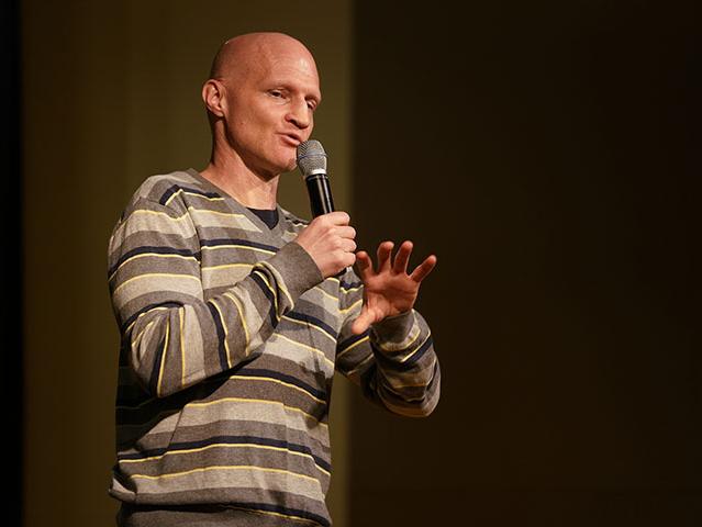 Scott Dickkers addresses an audience