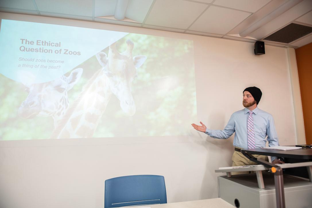 Student gives presentation in a class.