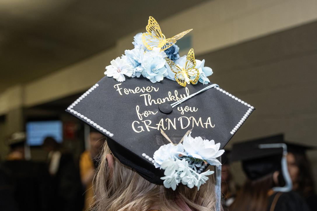 Decorated graduation cap with flowers.