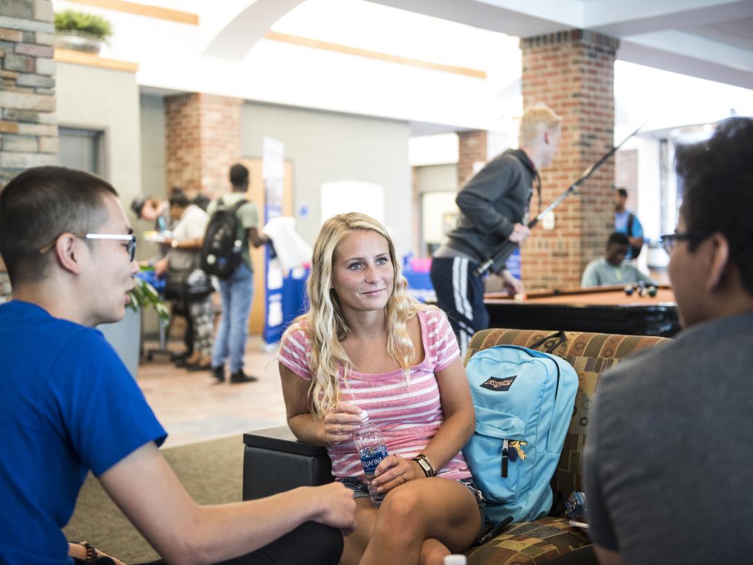 Students enjoying some downtime at student housing.