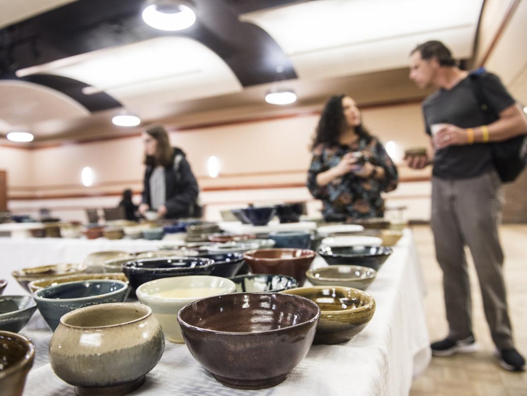 Table full of ceramic bowls.