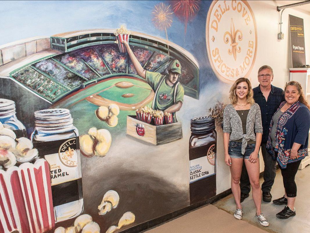 Sam Fulk, David and Patricia Beets admire the finished mural. 