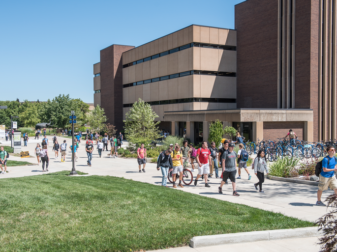 Students walking past Helmke Library