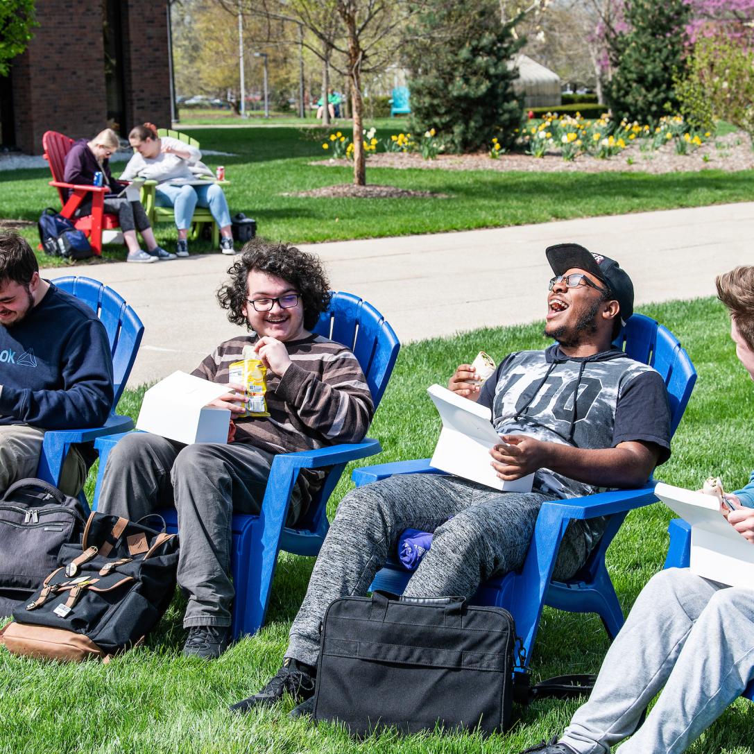 Students sitting outdoors