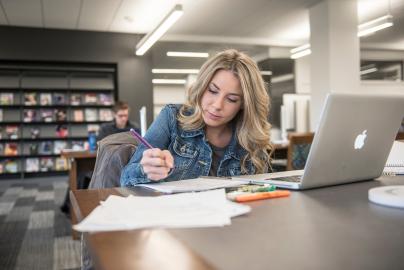 Student studying in the library.