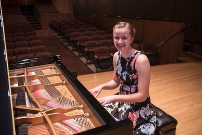 Student playing piano