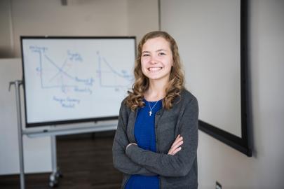 Female business student posing indoors.