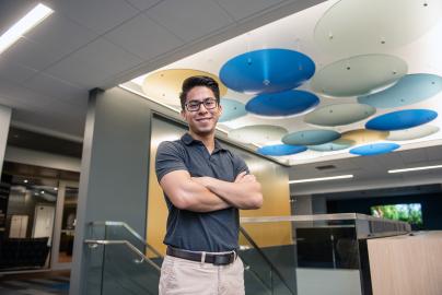 Alum Becerra in the library