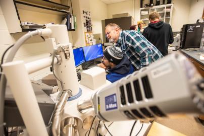 Student with microscope