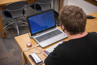 Student with computer