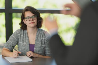 Student listening to lecture.