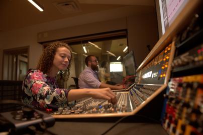 A student works on music tech.