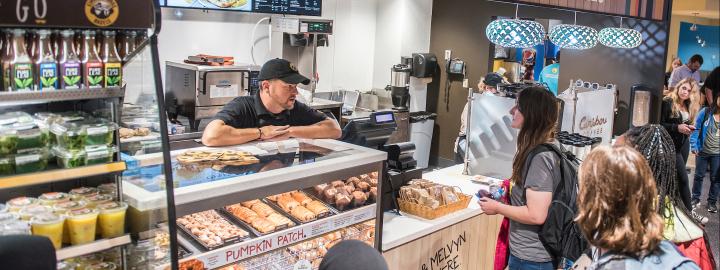 Students line up at Einstein Bros. to get bagels.