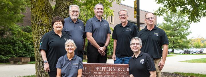 A group shot outdoors of the Accounting department staff