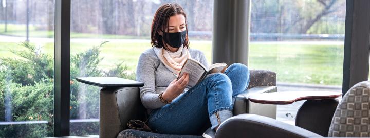 Student reading a book