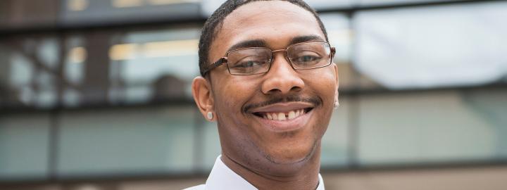 Student smiling outdoors