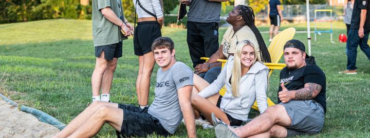 Students at a volleyball event for student housing.