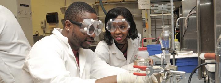 Chemistry lab with students doing experiments.