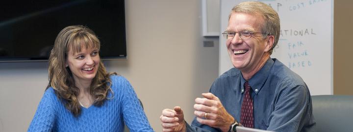 Michael Slaubaugh and student in an Accounting class