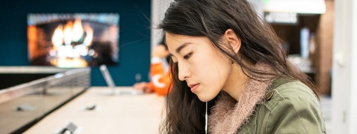 Student studying her class notes.