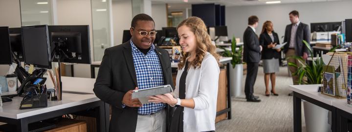 A group of DSB students in a downtown office