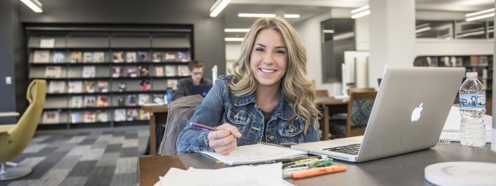 Student studying her class notes.