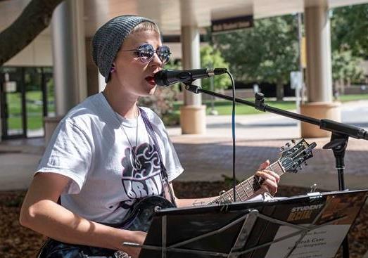 Gold Top Music Group recording artist Bear Case performs on the Alumni Plaza.