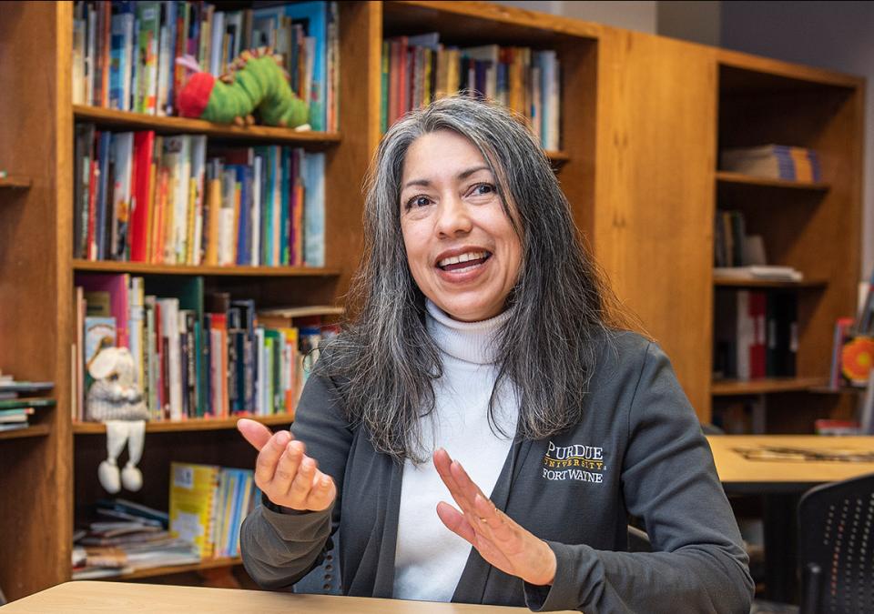 Portrait of Isabel Nunez in an office