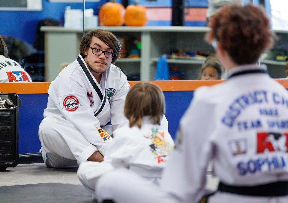 Elijah Solis teaching in a Taekwondo class