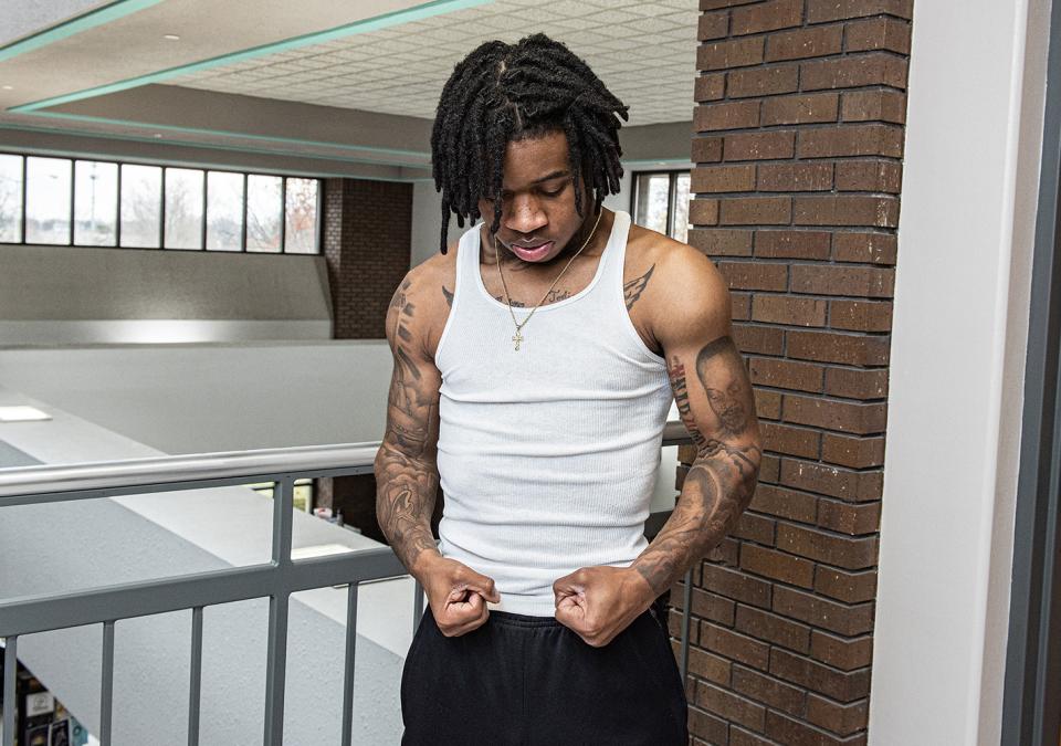 Triston Stevens poses in the lobby of the engineering building at Purdue Fort Wayne.