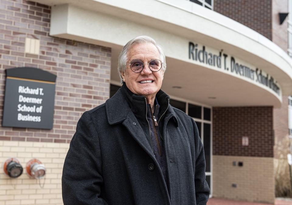 Portrait of Jim McHann outside the Doermer School of Business Building