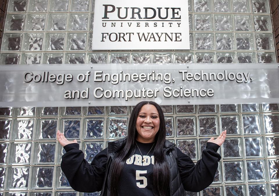 Ranesha Smith is standing in front of ETCS signage