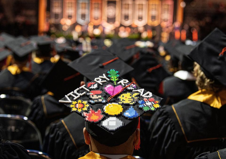 A graduate with a decorated cap.