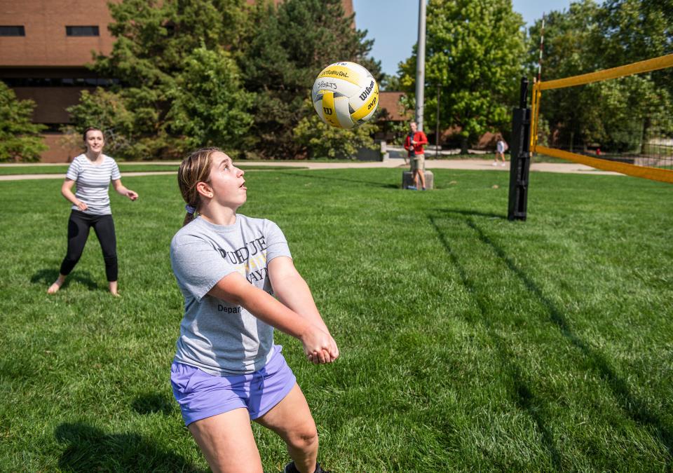 Students playing volleyball