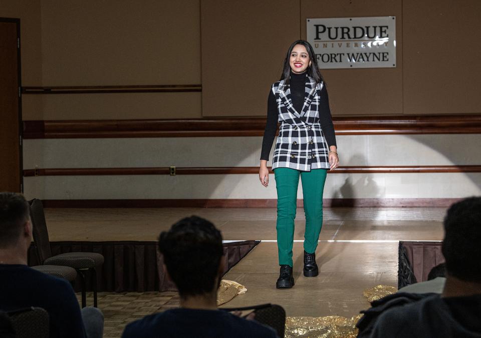 A student walks the runway during the Career Center fashion show at Purdue Fort Wayne.