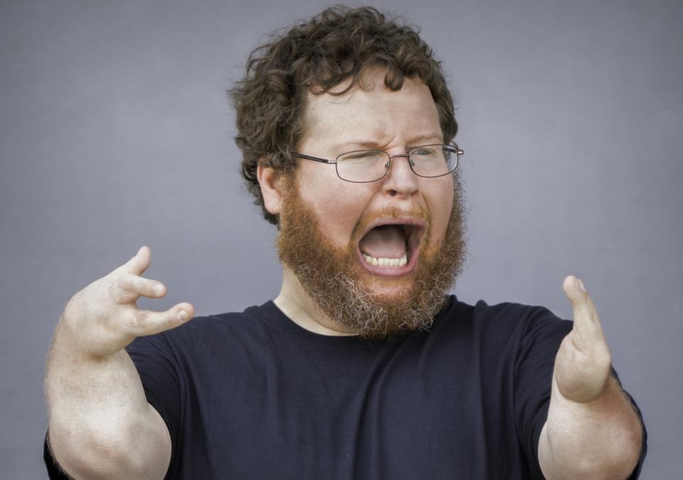 Photo of Ryan Niemiller performing stand-up comedy