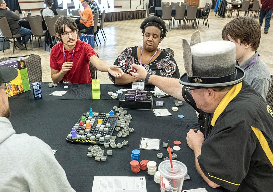 People are playing board games at MastodonCon