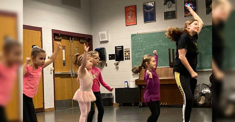 young children dancing