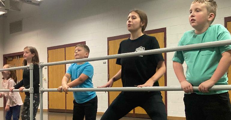 children at ballet bar