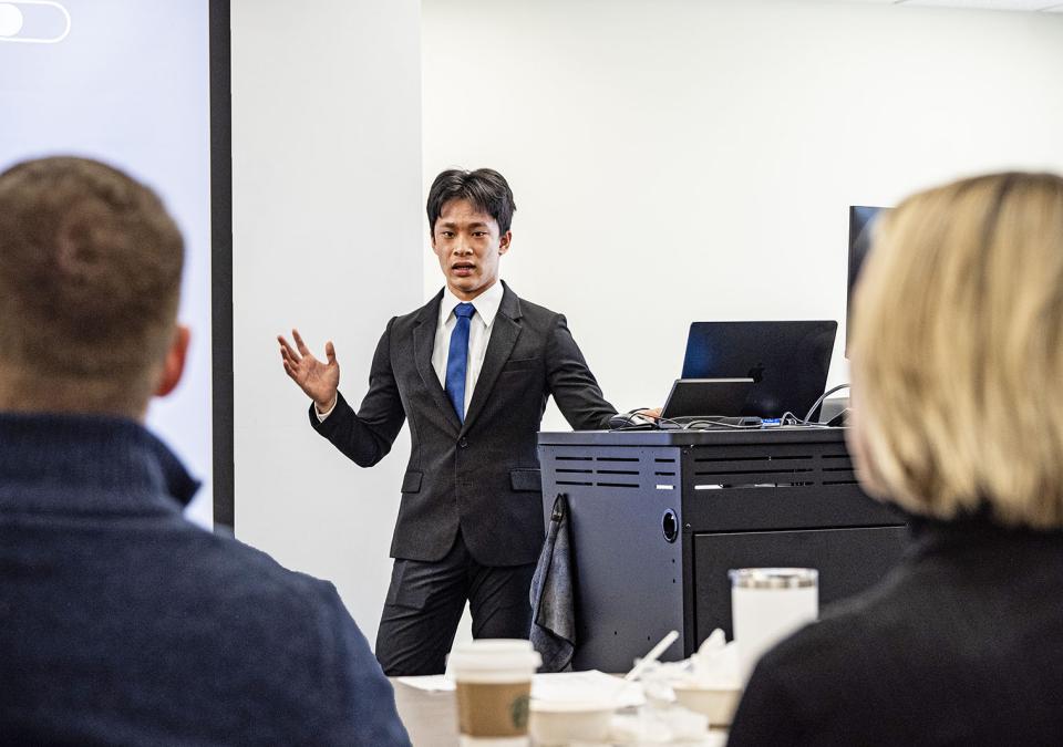 A student is making a business pitch