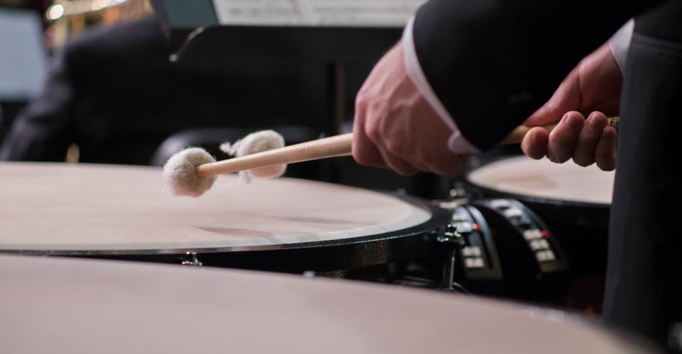 man playing timpani