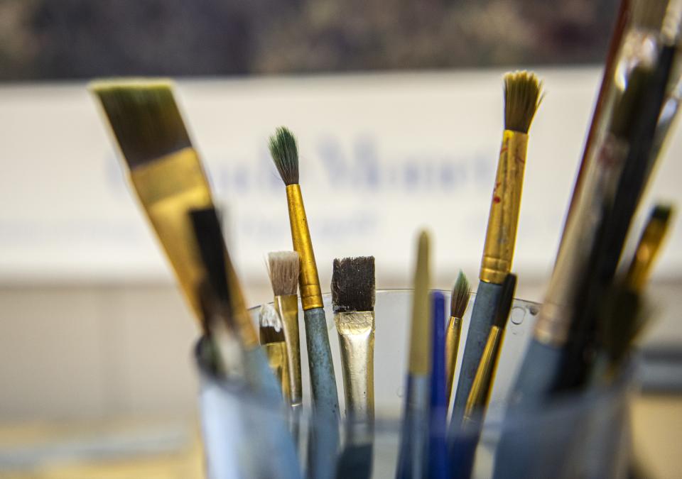 A close up of paint brushes.