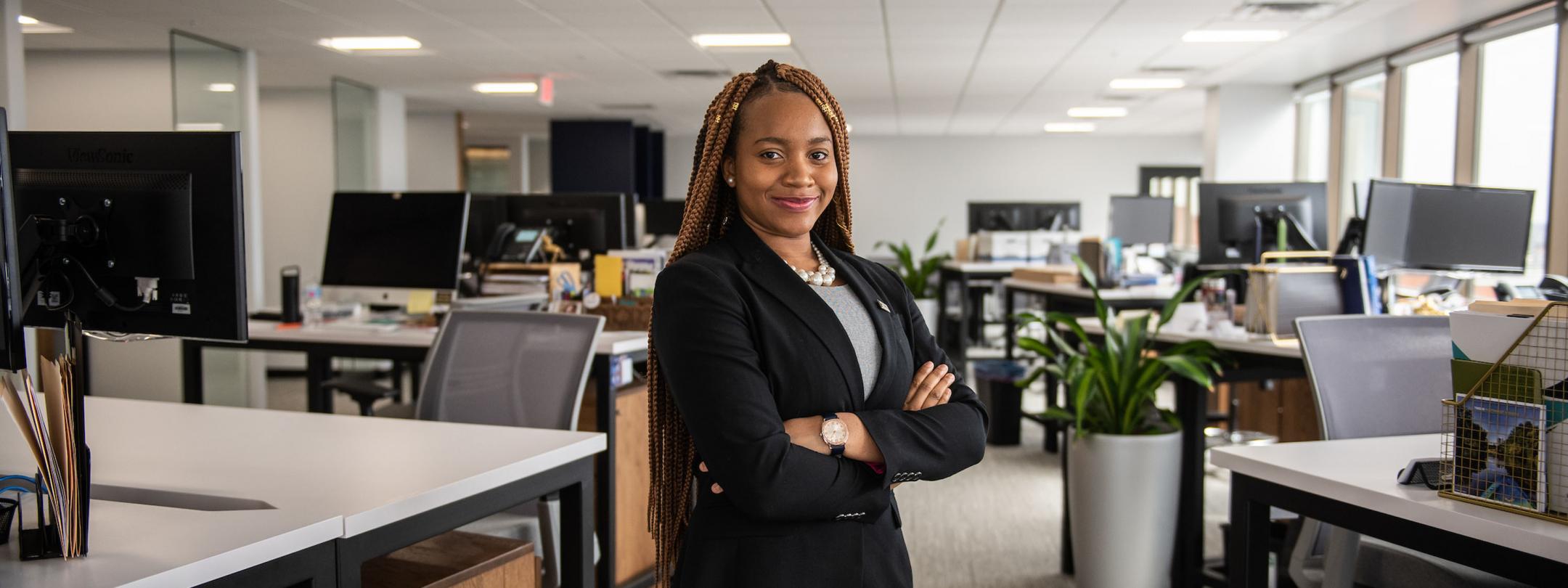 Female business student posing indoors.