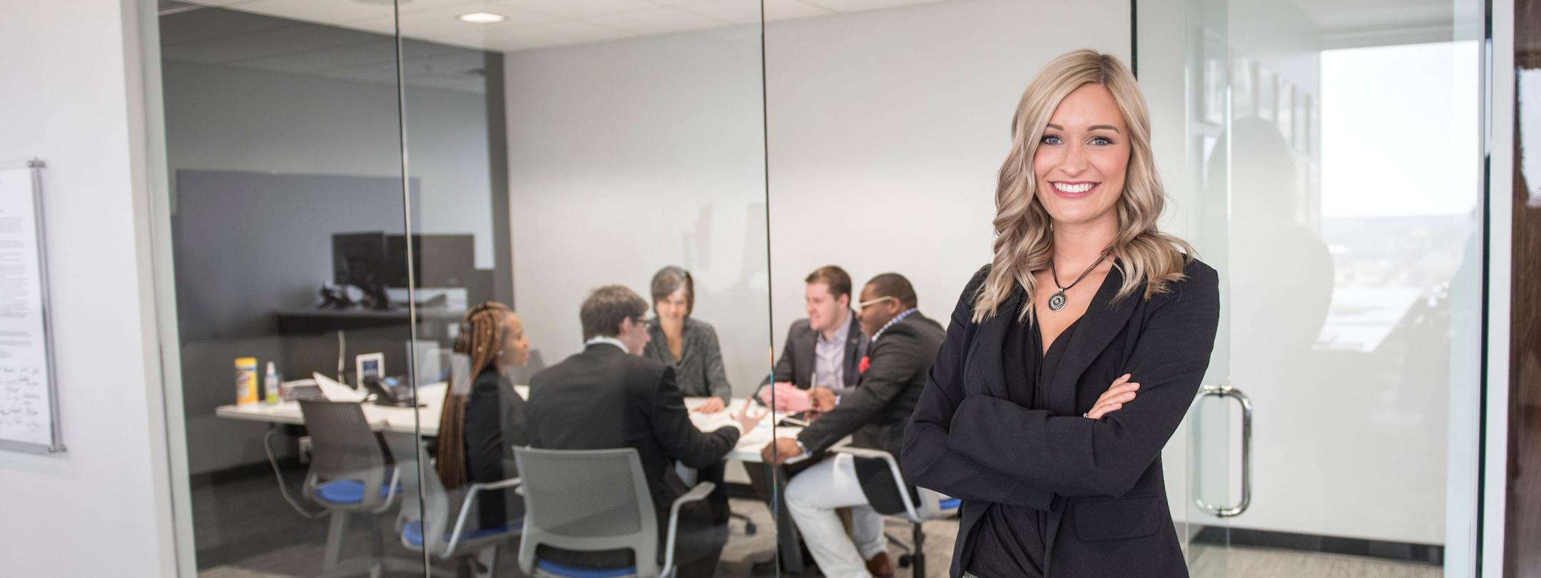 Female business student posing indoors.